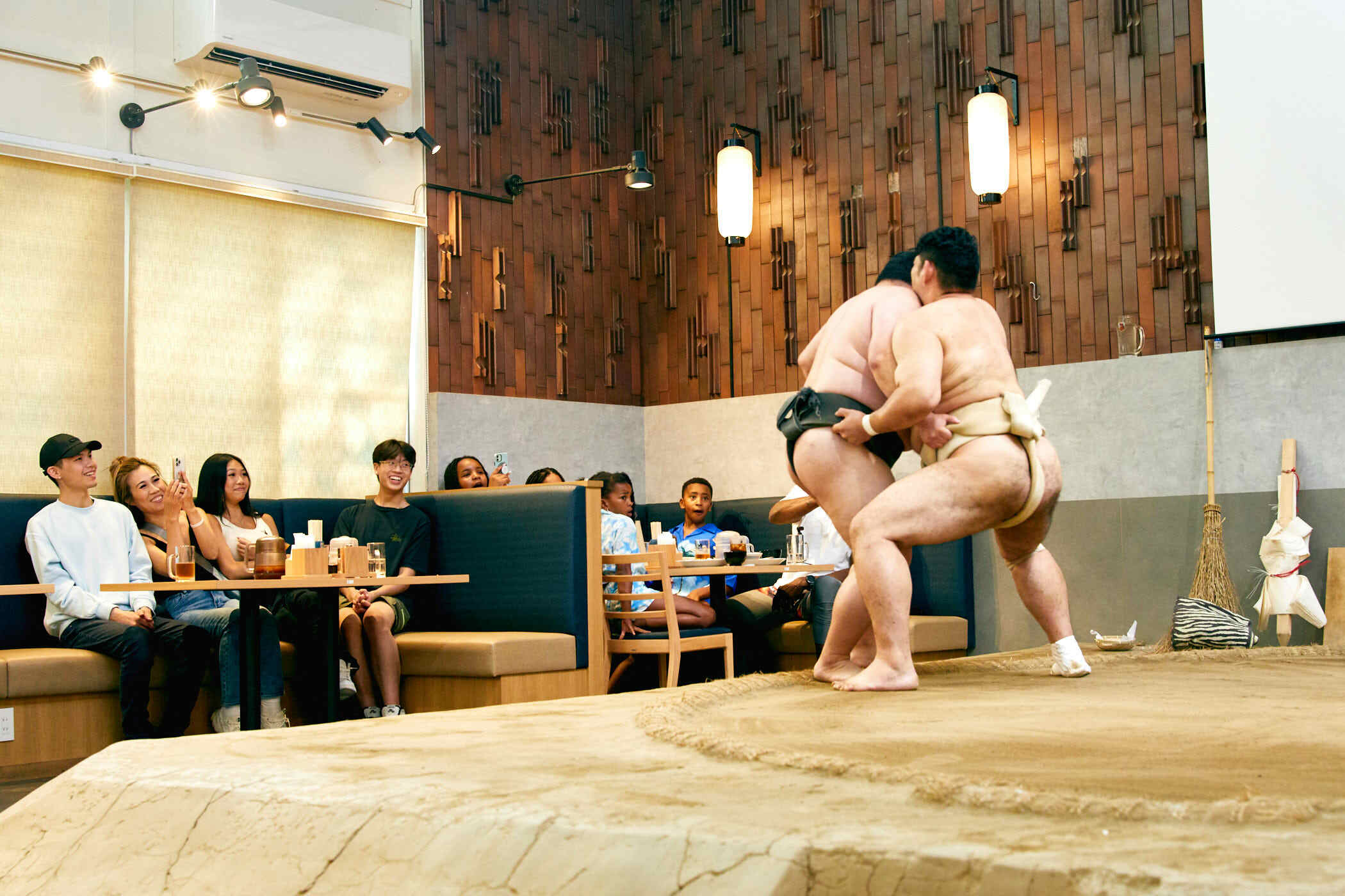 Audience watching a sumo show at a sumo entertainment venue in Tokyo
